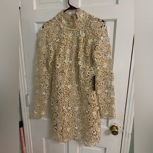 Size 10 Venus holiday dress. Gold with lace covering.